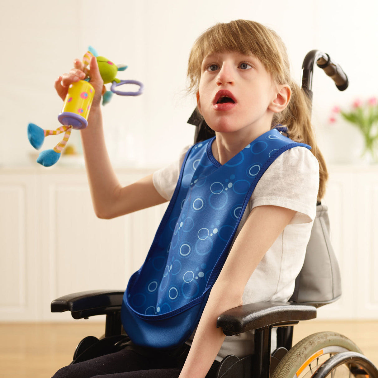 Junior Tabard style bib - Blue bubbles pattern