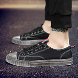 Black distressed casual shoes