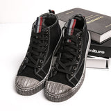 Black distressed casual shoes