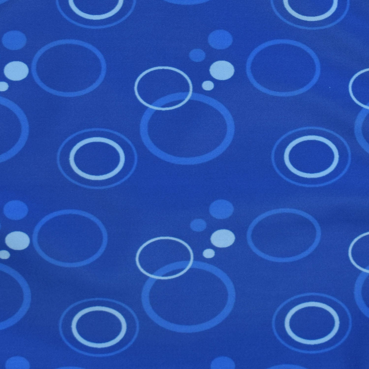 Junior Tabard style bib - Blue bubbles pattern