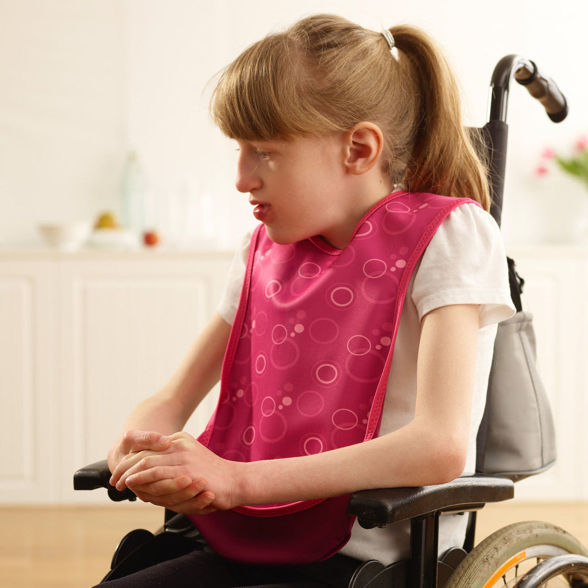 Junior Tabard Style Bib - Pink bubbles pattern