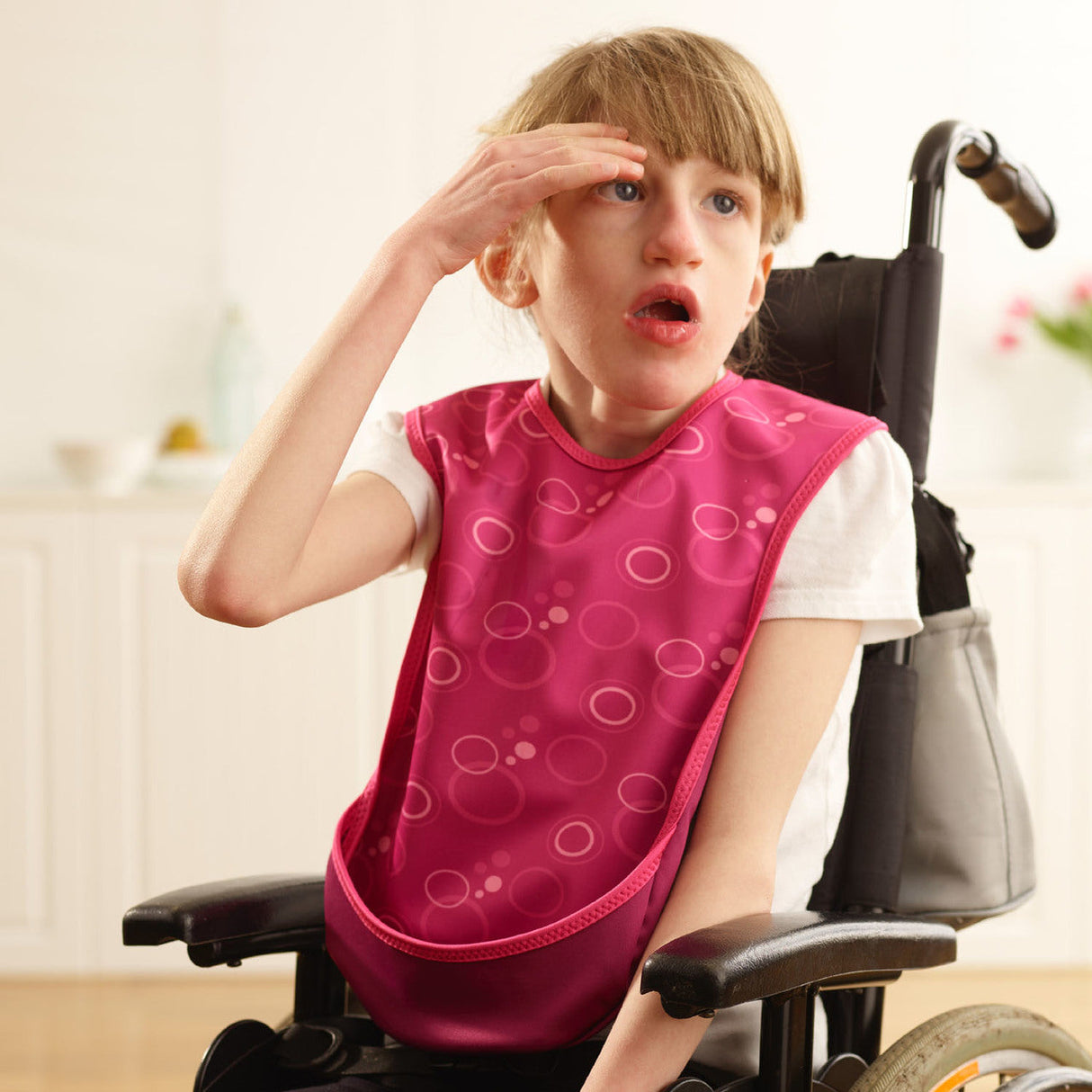 Junior Tabard Style Bib - Pink bubbles pattern
